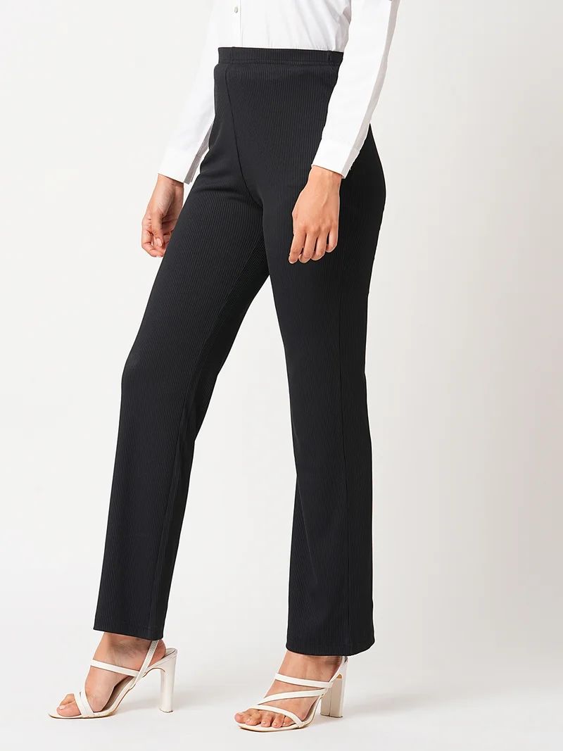 globus Women Black Self Design Mid-Rise Slim Fit Bootcut Stretchable Treggings