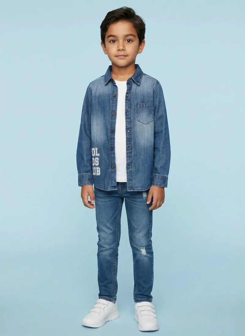 نوتيناتي Nautinati Boys' 100% Cotton Dark Wash Varsity Placement Print Denim Shirt