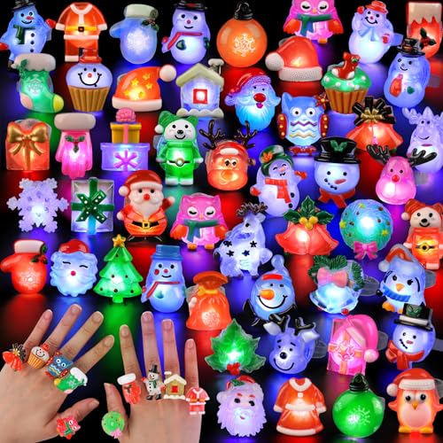 NPET 50pcs Christmas Light Up Led Rings Christmas Party Favors For Kids Class Stocking Stuffers Rings Toys Flashing Rings Glow In The Dark Christmas Toy For Boys Girls Gifts Ring Christmas Party Favor - Image 1