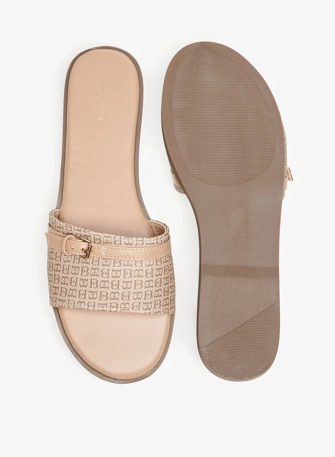 فلورا بيلا من شو إكسبرس Womens Monogram Print Slip-On Flat Sandals