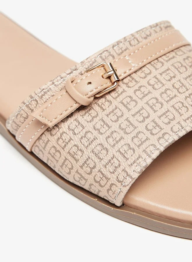فلورا بيلا من شو إكسبرس Womens Monogram Print Slip-On Flat Sandals