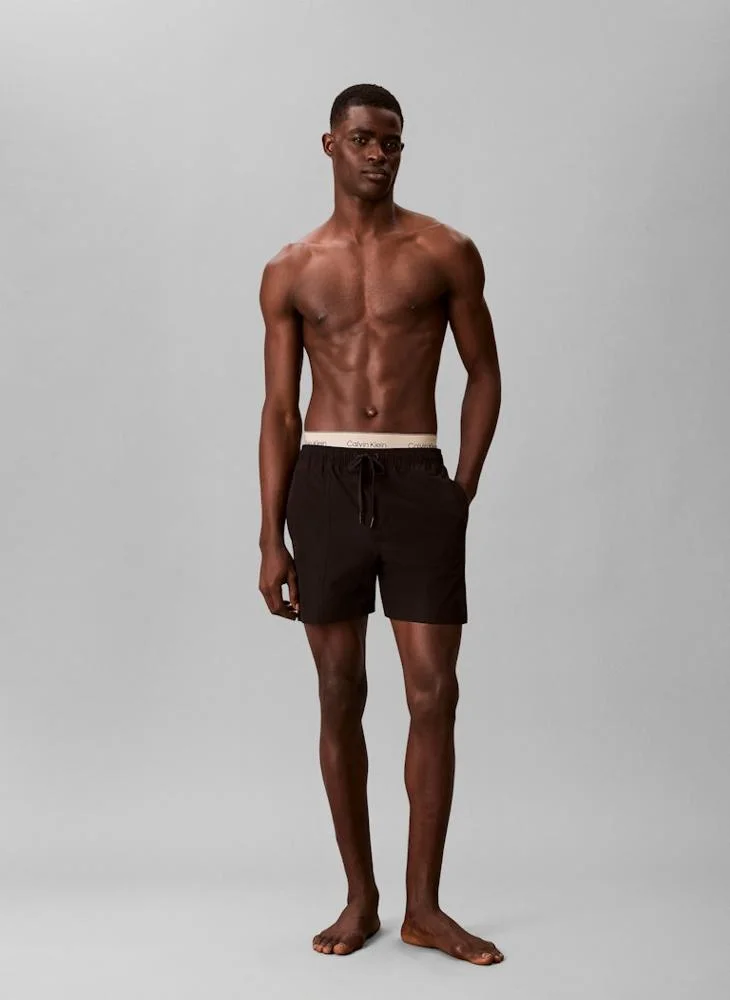 CALVIN KLEIN  Double Logo Waistband Swim Shorts for Men | Best Price UAE