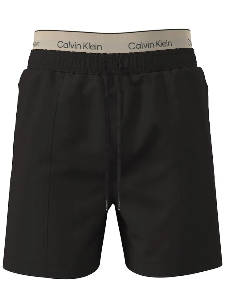 CALVIN KLEIN  Double Logo Waistband Swim Shorts for Men | Best Price UAE