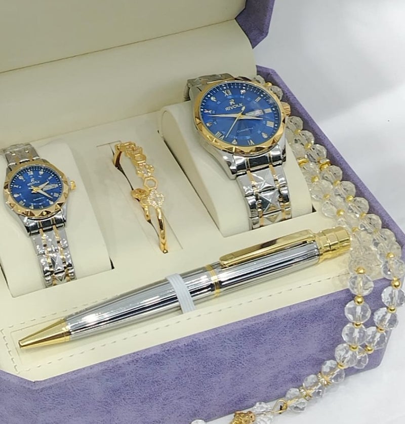 Watch set consisting of a men's watch, a women's watch, a pen, a bracelet, and a ring.