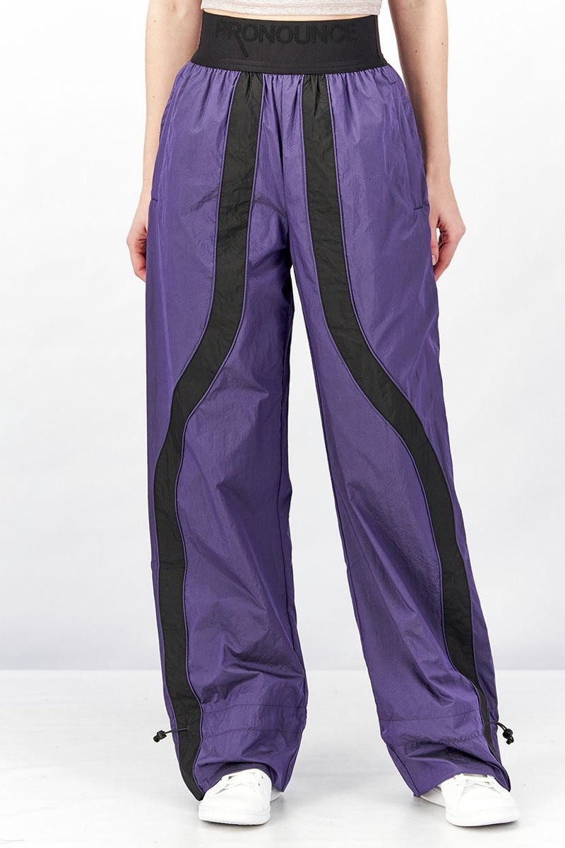 PUMA Women Sportswear Fit Pronounce High Waist Woven Pants, Purple and Black  - Image 1