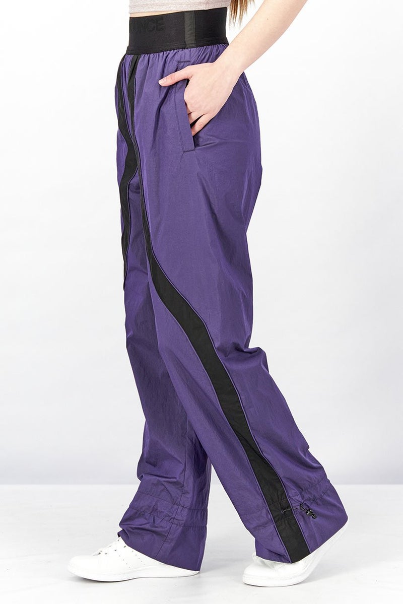 PUMA Women Sportswear Fit Pronounce High Waist Woven Pants, Purple and Black  - Image 2
