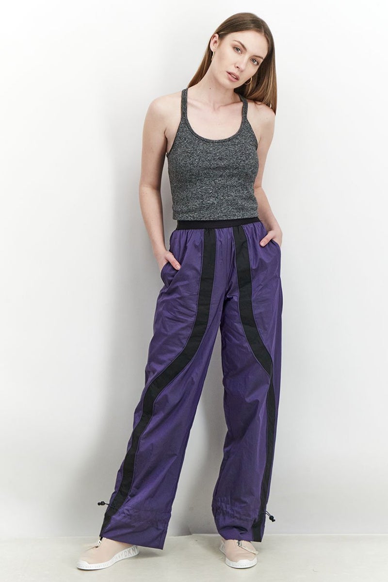 PUMA Women Sportswear Fit Pronounce High Waist Woven Pants, Purple and Black  - Image 3