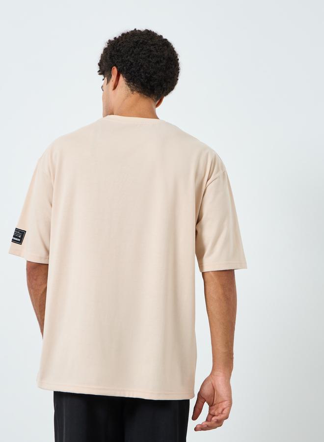 Styli Men Beige Graphic Oversized T-Shirt - Image 4