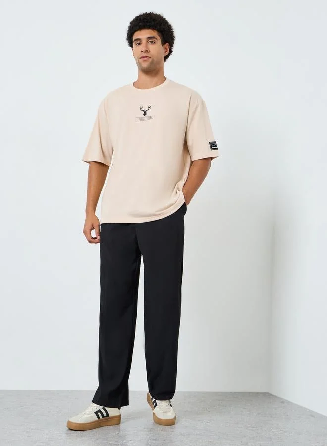 Styli Men Beige Graphic Oversized T-Shirt