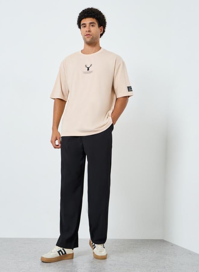 Styli Men Beige Graphic Oversized T-Shirt - Image 2