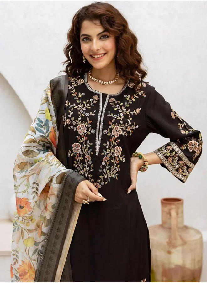 ISHIN Embroidered Women Black Muslin Kurta Set with Embroidered pattern Tunic and Palazzo features a Round neckline and Three-Fourth Sleeve secured with Elastic closure and styled in Straight Fit ideal for Festive moments — designed to make heads turn.