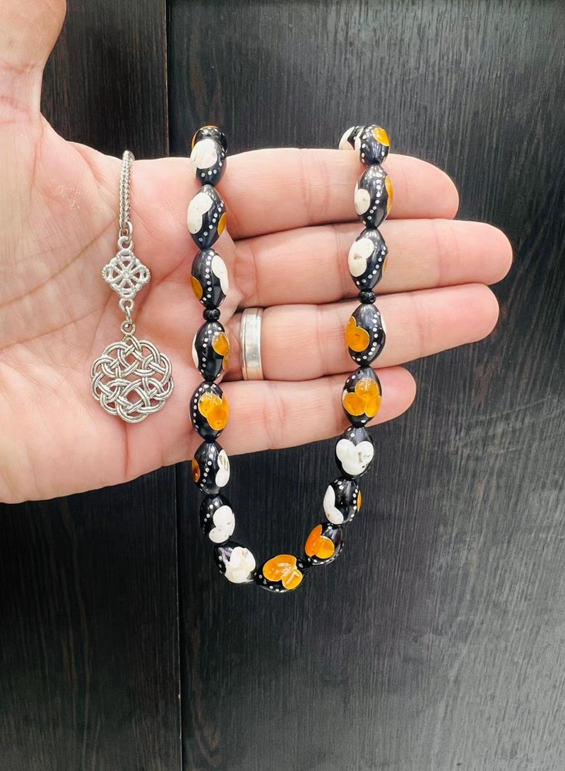A wonderful rosary made of cocoa wood with a mixture of stone and metal on it, with a distinctive Trabzon metal tassel. We present it in a box to make it easy to present as gifts to loved ones. It is suitable for all occasions, Hajj, Umrah, Ramadan and holidays. Bead size 8 mm Number of beads 33 beads - Image 2