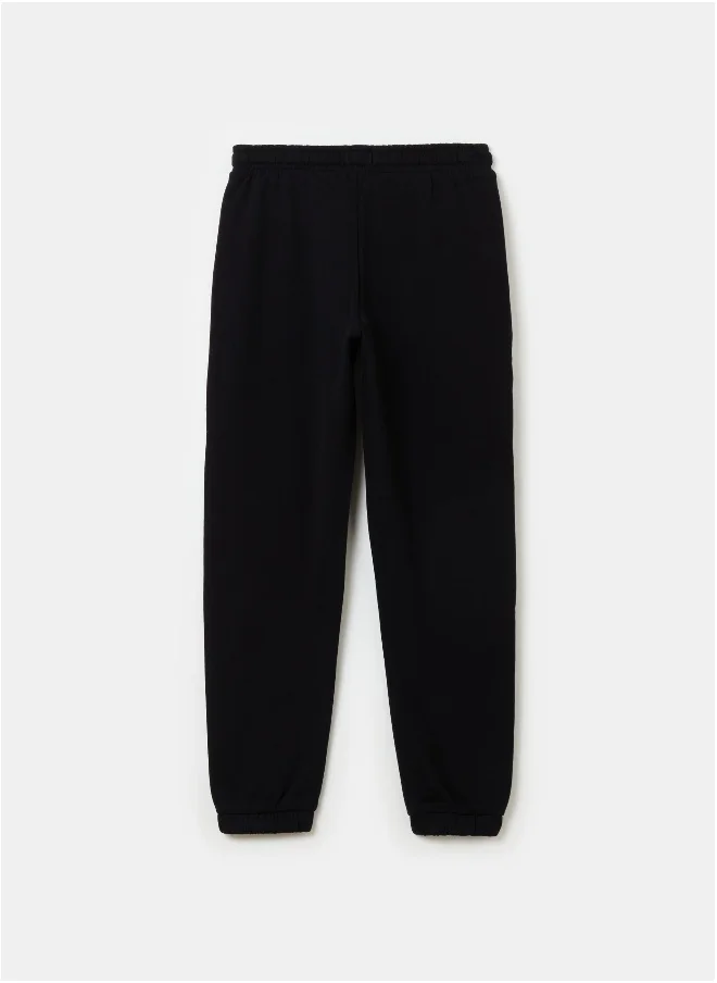 او في اس Fleece joggers with drawstring and print