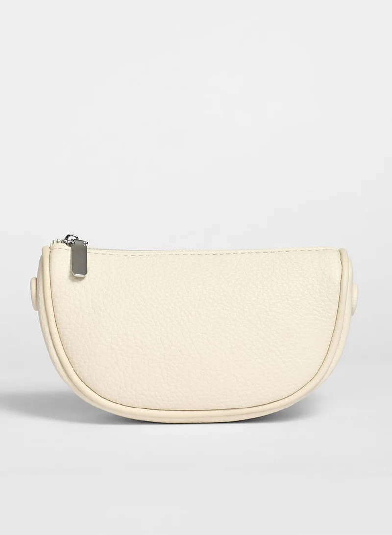 Haute Sauce Solid Zip Lock Regular Vegan Leather Sling Bag with Detachable Strap For Women