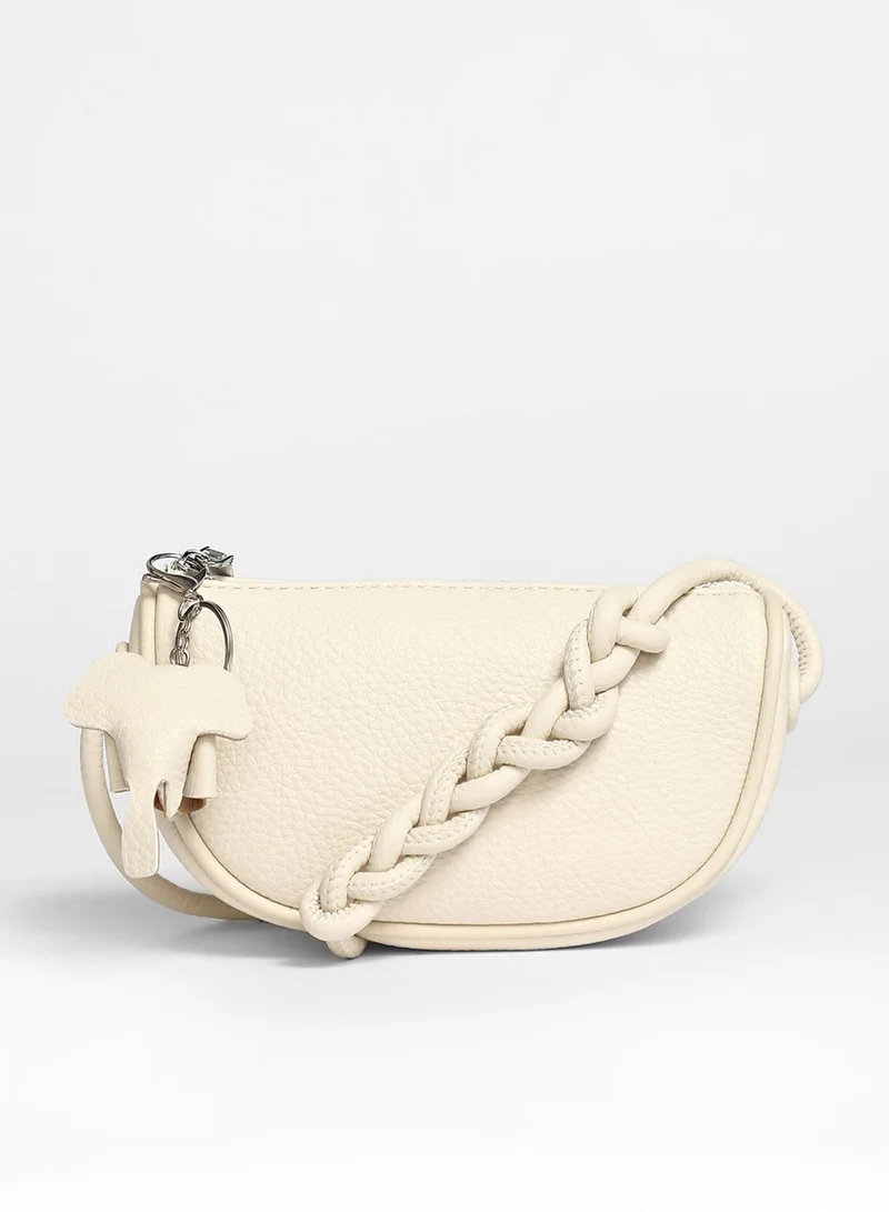 Haute Sauce Solid Zip Lock Regular Vegan Leather Sling Bag with Detachable Strap For Women