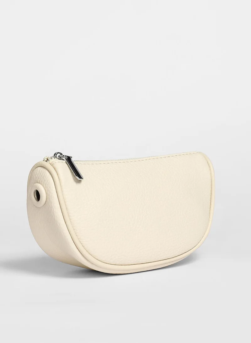 Haute Sauce Solid Zip Lock Regular Vegan Leather Sling Bag with Detachable Strap For Women