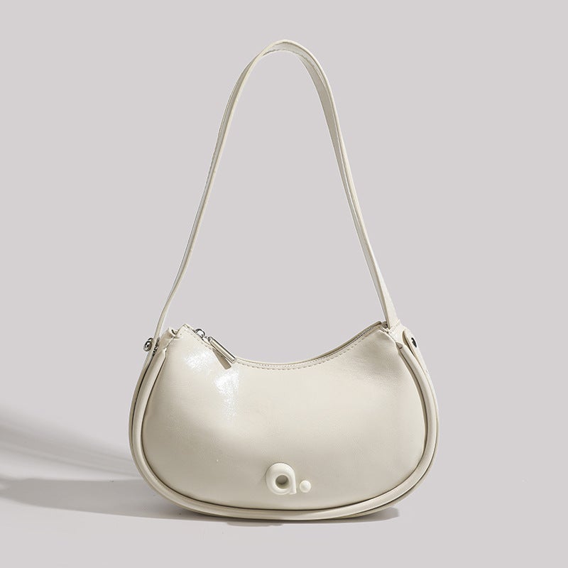 French Niche High-End Armpit Womens Bag 2023 New Fashion Simple Pure Color Cashew Bag Single Shoulder Crossbody Bag White
