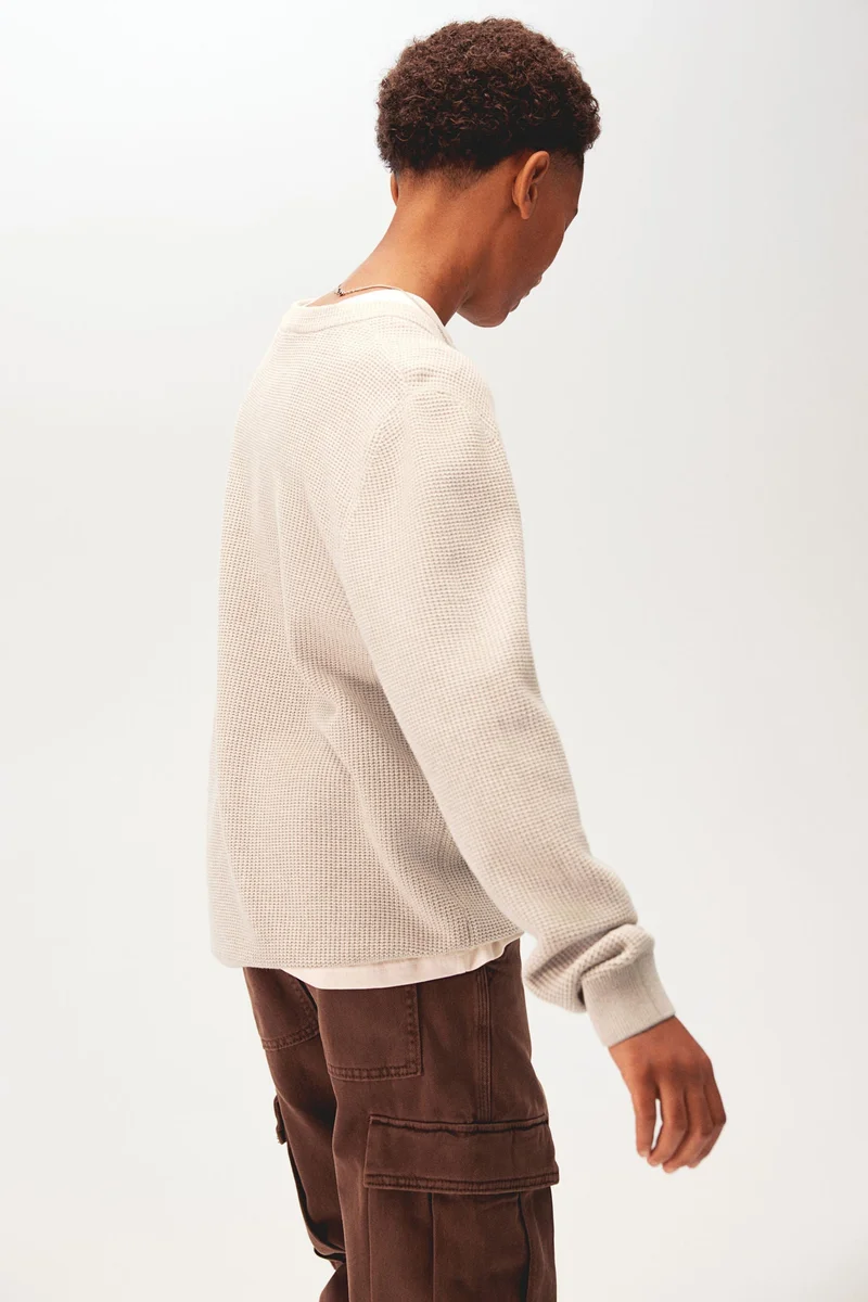 اتش اند ام كنزة محبوكة بنقوش