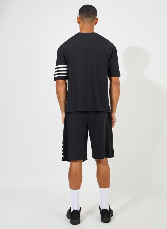 Styli Oversized Stretch Pique Knit T-Shirt and Striped Shorts Set - Image 4