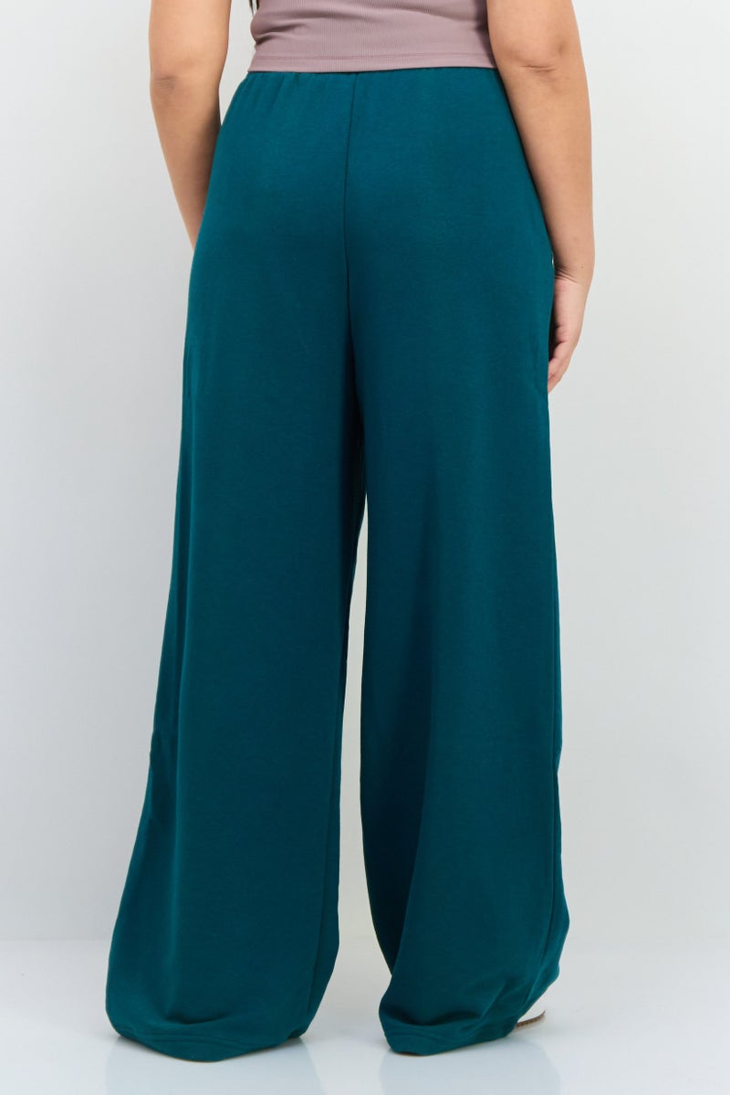 PUMA Women Relaxed Fit Drawstring Outdoor Sweatpants, Green - Image 2