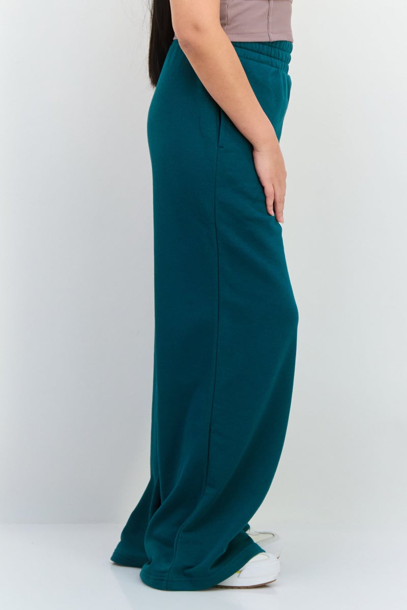 PUMA Women Relaxed Fit Drawstring Outdoor Sweatpants, Green - Image 4