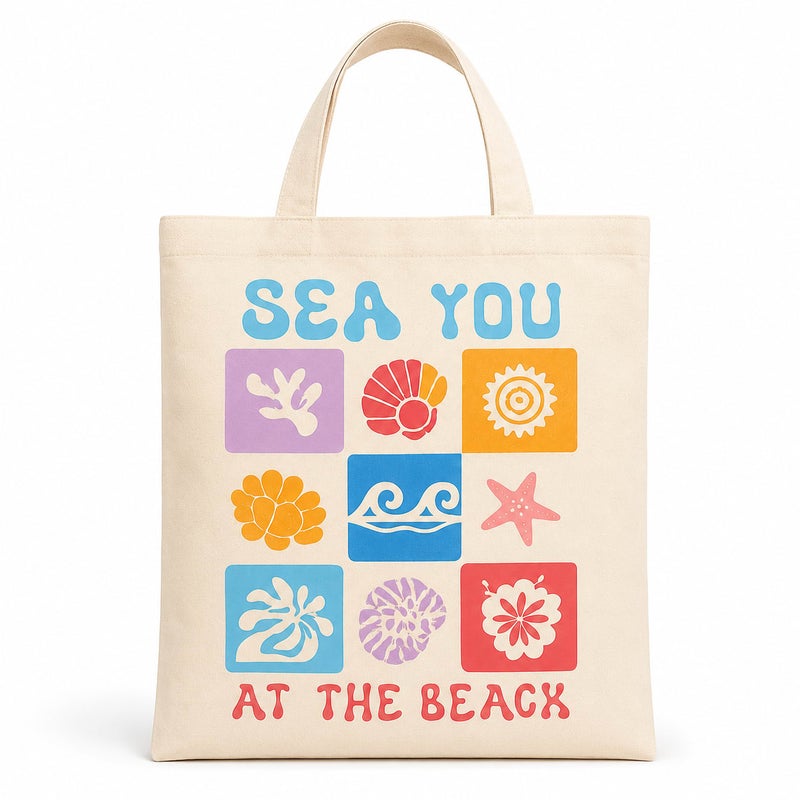 شنطة قماش كانفاس حريمي بطبعة "Sea You At The Beach" بأشكال بحرية ملوّنة، حقيبة صديقة للبيئة قابلة لإعادة الاستخدام للبحر والتسوق، مقاس كبير 30×40 سم - Image 1