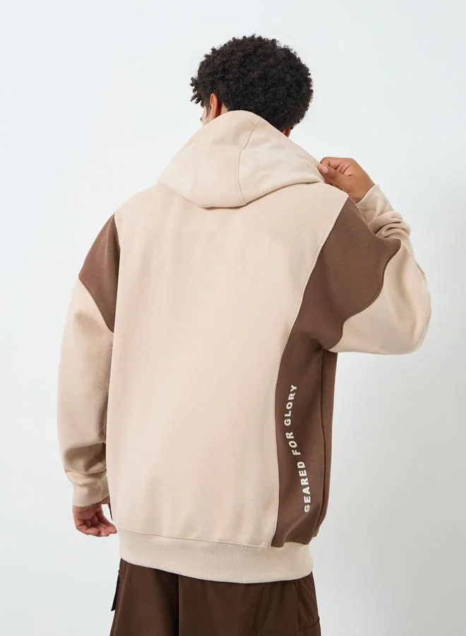 Styli Men Beige Embroidered Panel Hoodie