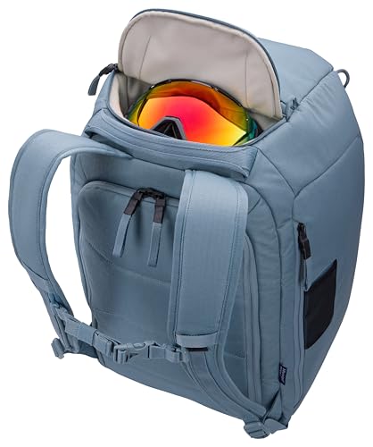 Thule RoundTrip 45L Boot Backpack - Storage compartments to organize and protect gear - Boot bag for ski and snowboard travel - Soft pocket for goggles and helmet - Built in standing pad - Image 4