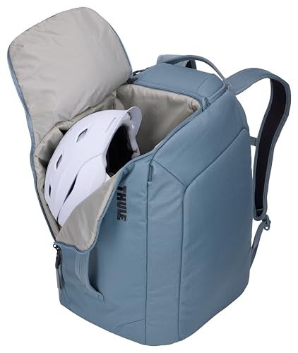 Thule RoundTrip 45L Boot Backpack - Storage compartments to organize and protect gear - Boot bag for ski and snowboard travel - Soft pocket for goggles and helmet - Built in standing pad - Image 5
