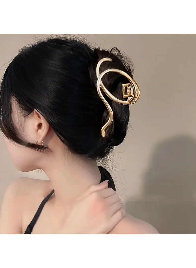 Goolsky Minimalist Golden Hair Claw With Hollow Design, Resembling A Shark Fin Hair Clip  - Image 1