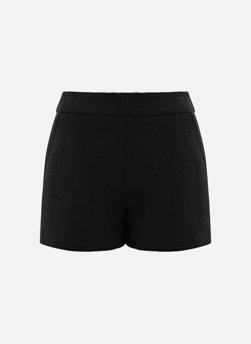 Lichi Textured mini shorts