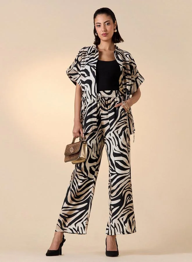 ايكونيك بنطلون بطبعة حيوانات بقصة مريحة مع رباط وجيوب