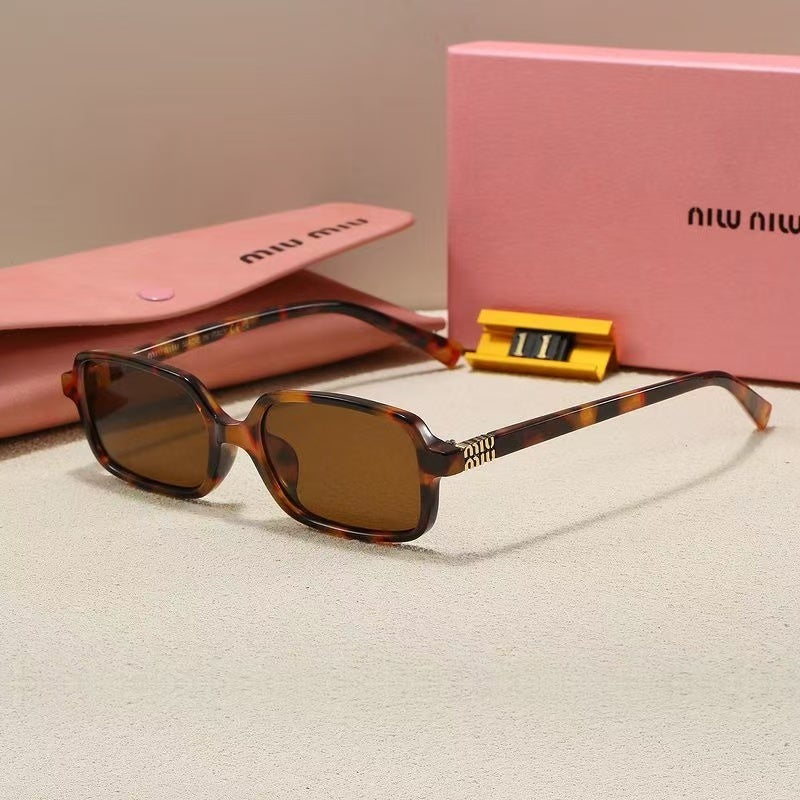 Miumoon Italian-made Miu Miu oval luxury cycling sunglasses for women. - Image 1