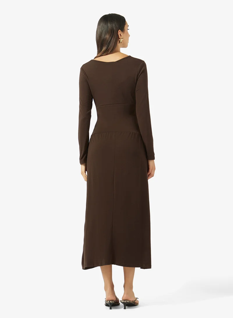 Ginger V Neck Drop Waist Pleat Detail Dress