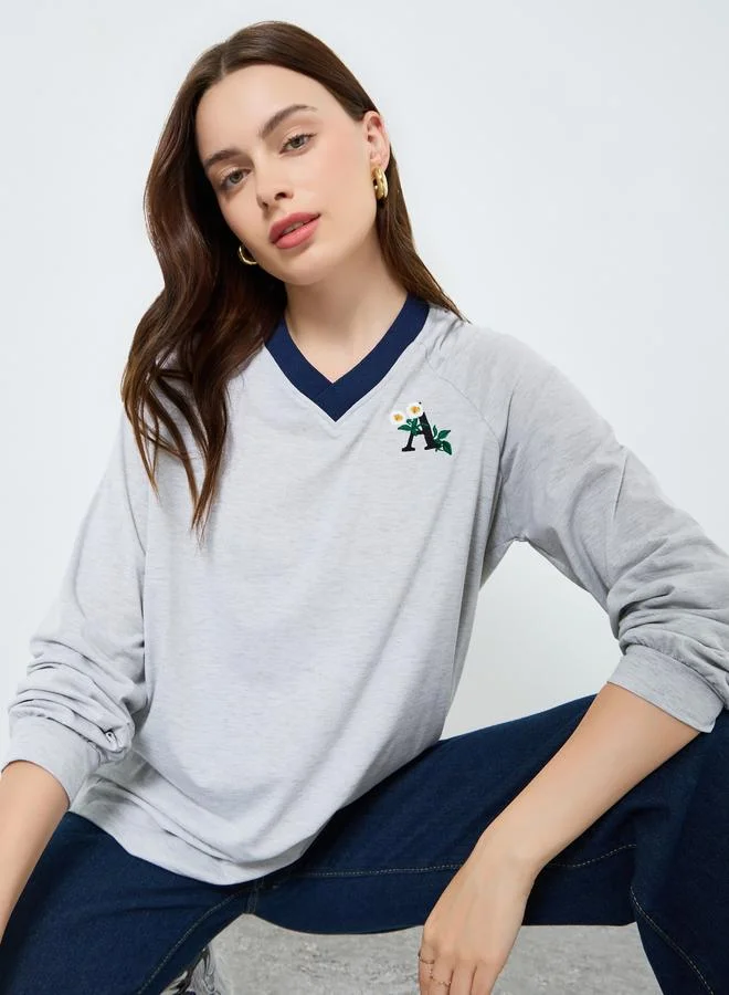 Styli Embroidered V-neck T-shirt with Decorative Strips