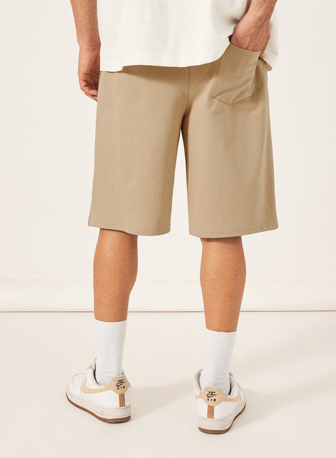 ستايلي شورت سادة فضفاض بأربطة خصر - Image 4