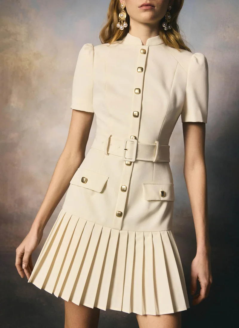 Mini dress with short sleeves and a pleated skirt
