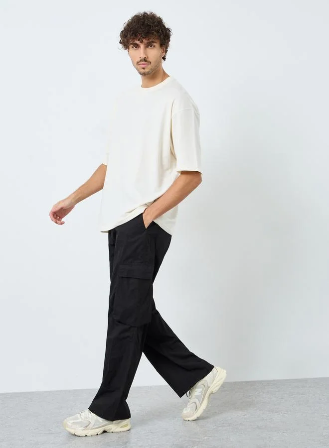 Styli Men Oversized Cargo Pocket Pants