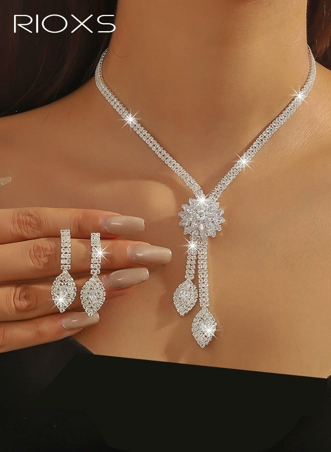 RIOXS 2 Pcs Rhinestone Jewelry Set for Women, Silver Glitter Flower Crystal Earrings and Necklaces, Sparkly Dainty Costume Wedding Party Jewelry Set for Bride, Bridesmaid, Mom, Girlfriend, Sister and Your Loved - Image 1