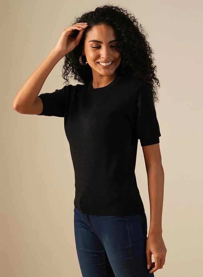 جلو باص سويتر محبوك اسود بياقة دائرية