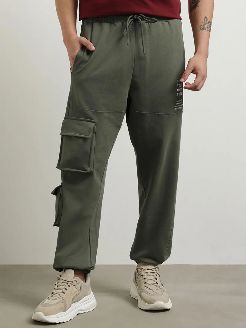 نوبيرو سراويل رياضية فضفاضة رجالية باللون الزيتوني