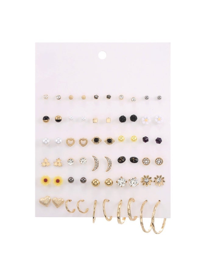 ووفيكسر مجموعة أقراط متنوعة تضم أكثر من 30 زوجًا من الأقراط المرصعة والحلقية، تتضمن أقراطًا ذهبية على شكل زهرة عباد الشمس وقمر ونجمة وكريستال أسود، بالإضافة إلى مجوهرات من اللؤلؤ والأشكال الهندسية، هدية مثالية للنساء والفتيات. - Image 1