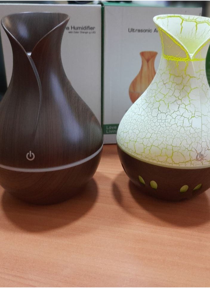 ماركة غير محددة - فازه فواحه  - الفواحة بإنارة 7 الوان ممكن اضافة عطر مائي لتزويد البخار بلمسة عطرية ناعمة في السيارة او البيت او المكتب - Image 1