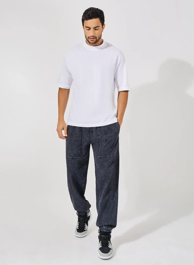 Styli Styli Acid Wash Relaxed Fit Joggers with Elasticated Cuff