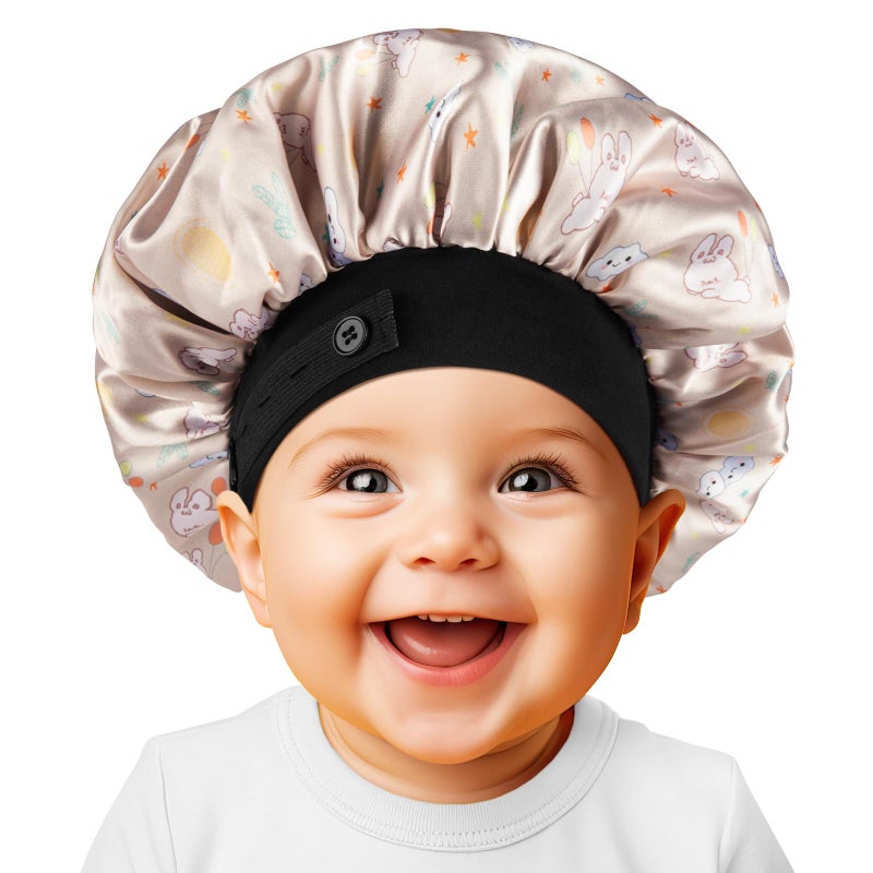 WINSTECK Baby Bonnet قلنسوة حريرية ناعمة من الساتان للفتيات والأولاد والرضع طبقة مزدوجة وشريط مطاطي واسع للأطفال، قبعة نوم قابلة للتعديل للأطفال الصغار، شعر طبيعي مجعد، أرنب شامبانيا - Image 1