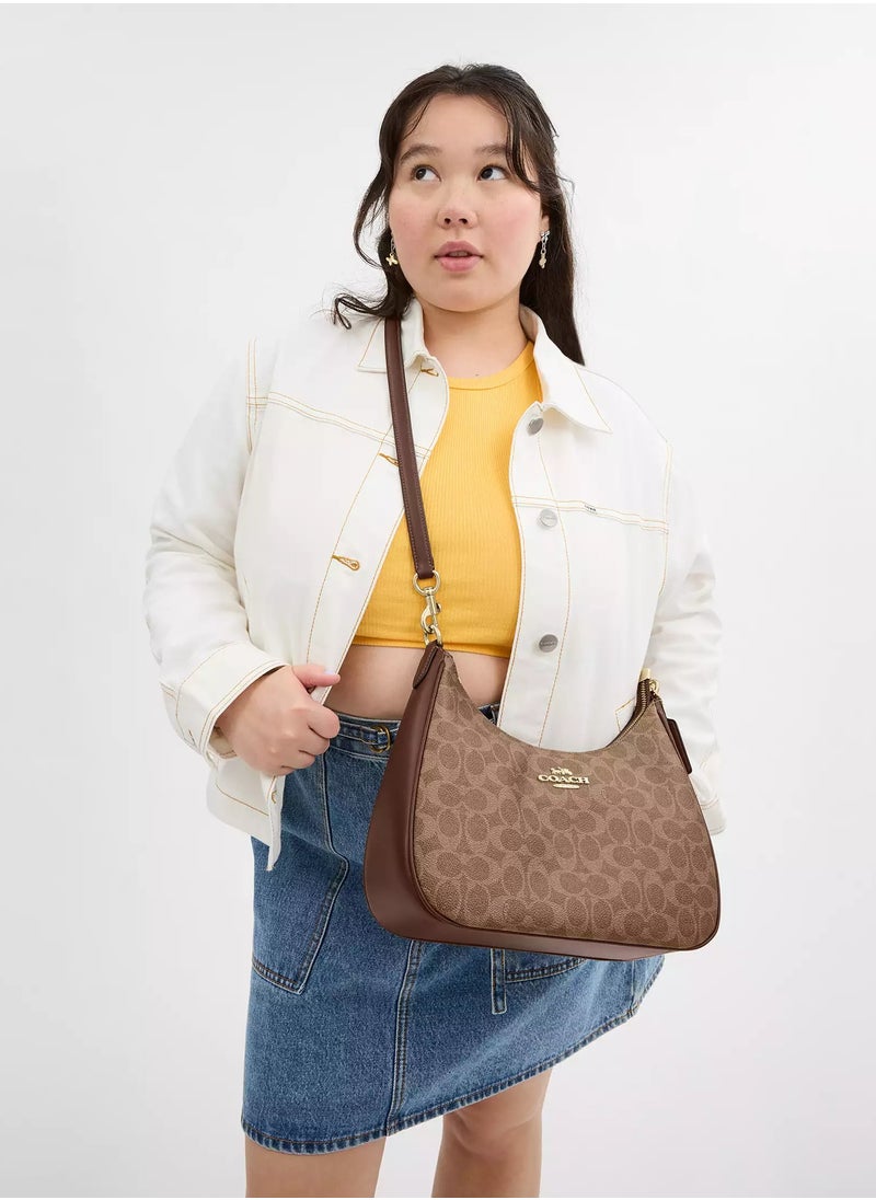 coachoutlet - Coach Teri Hobo Bag In Signature Canvas - Image 1