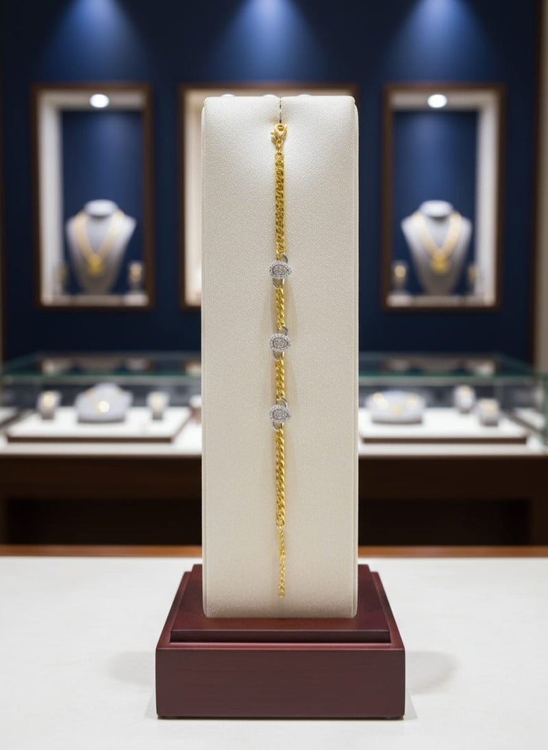 A thick gold-plated chain bracelet with three pendants in the shape of shiny water drops or tears, with a silver plate studded with clear stones - additional links for size adjustment. - Image 3