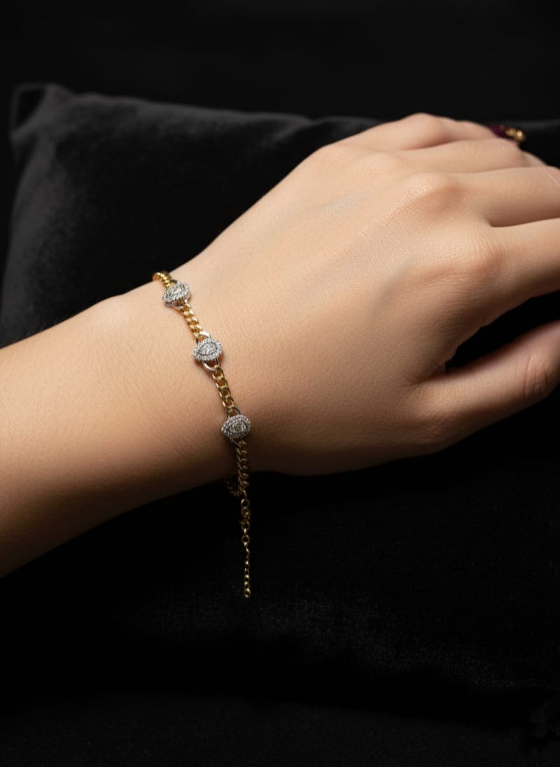 A thick gold-plated chain bracelet with three pendants in the shape of shiny water drops or tears, with a silver plate studded with clear stones - additional links for size adjustment. - Image 5