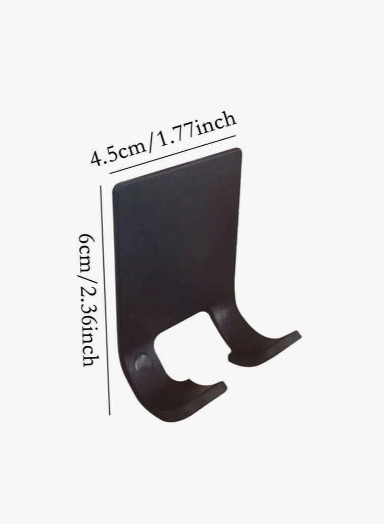Adhesive Hooks, a set of adhesive hooks for walls, 4 pieces of wall adhesive hooks, easy-to-install and versatile wall holder, sticky clothes hanger, adhesive hook without drilling, wall-mounted key holder, wall-mounted adhesive hook, kitchen tool holder, bathroom tool holder, adhesive hook for the wall, shower loofah holder, holder for kitchen utensils like forks, spoons, knives, and spatulas, cooking spatula holder, wall-mounted socket holder, electrical plug holder, plug holder, electrical wire holder next to the socket - a set of 4 pieces - black color - Image 2