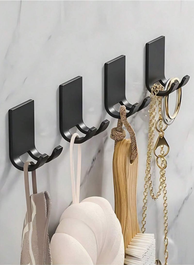 Adhesive Hooks, a set of adhesive hooks for walls, 4 pieces of wall adhesive hooks, easy-to-install and versatile wall holder, sticky clothes hanger, adhesive hook without drilling, wall-mounted key holder, wall-mounted adhesive hook, kitchen tool holder, bathroom tool holder, adhesive hook for the wall, shower loofah holder, holder for kitchen utensils like forks, spoons, knives, and spatulas, cooking spatula holder, wall-mounted socket holder, electrical plug holder, plug holder, electrical wire holder next to the socket - a set of 4 pieces - black color - Image 4